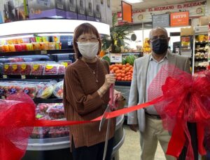 Photo of the late District 3 Board of Supervisor, Wilma Chan, and Rancho Market’s store owner, Abdu (Alex) Almahen, at the Ribbon cutting for Rancho Market’s new refrigerator