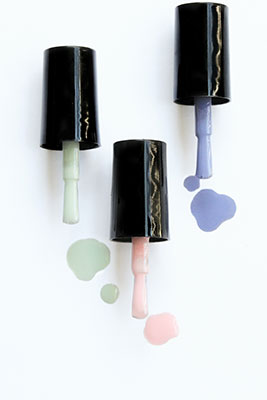 Photo of wet nail polish brushes